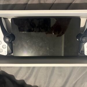 Sony Portable Handheld Gaming Controller - White and Black